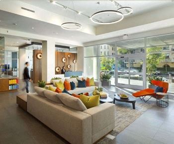 a living room with a couch and a table